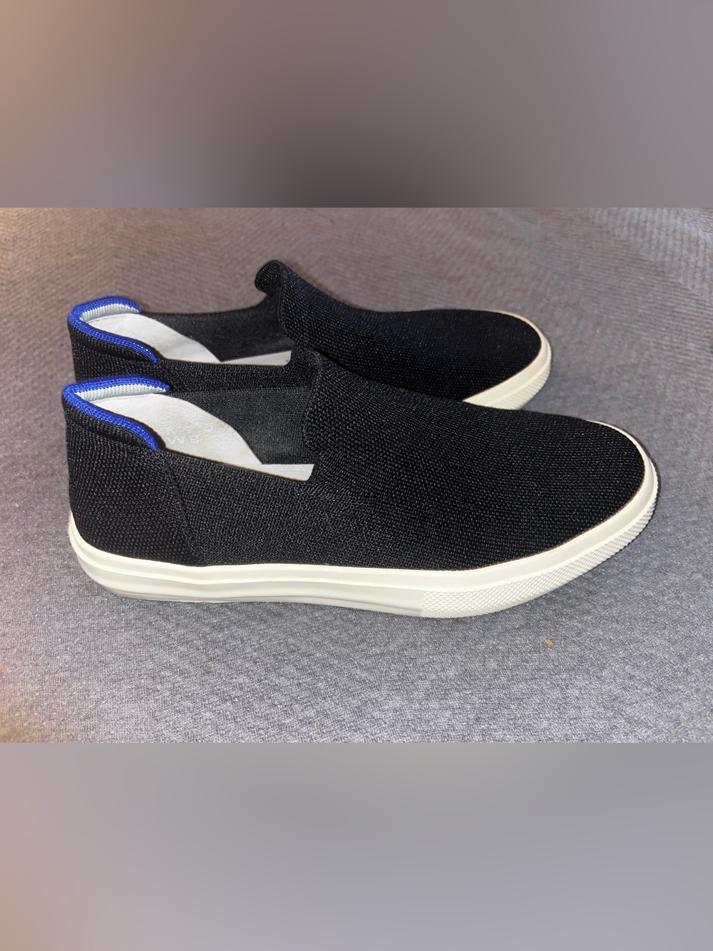 EUC Rothy's The Original Slip-On Sneakers in black. Size 9